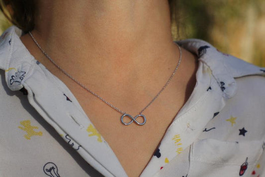 Bougie bijoux canelle -collier plaqué argent infini